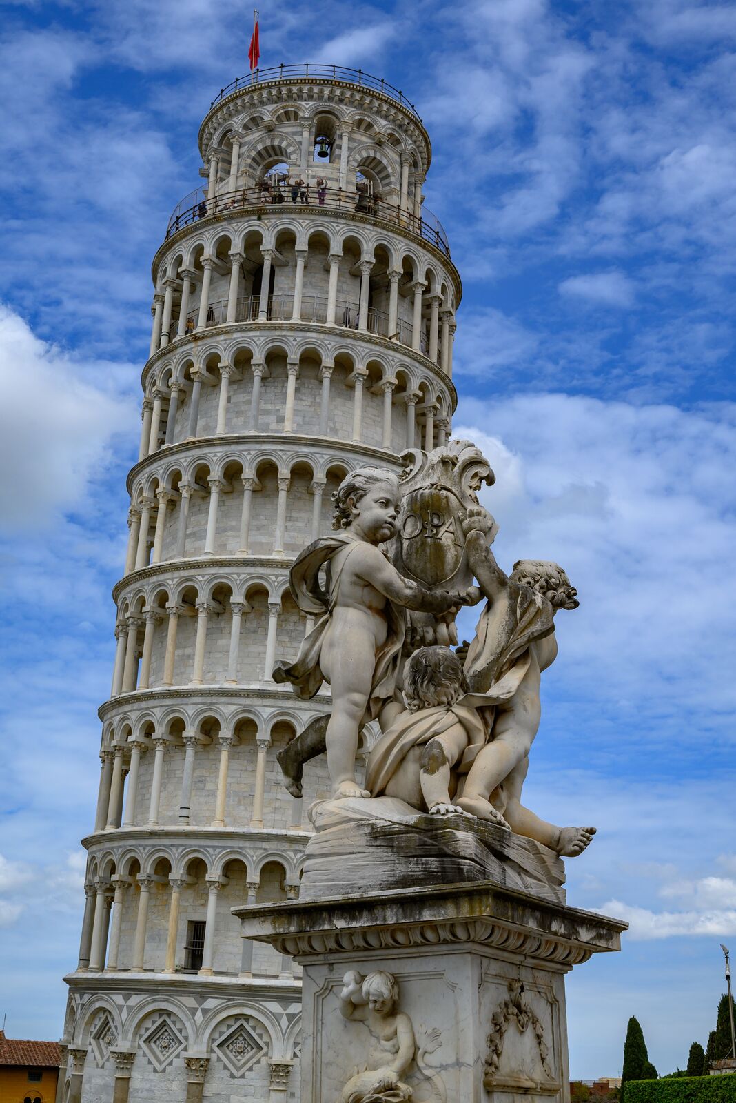 The Leaning Tower of Pisa against a blue sky